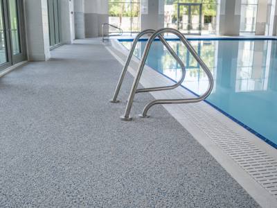 Indoor pool deck finished in rubber surfacing
